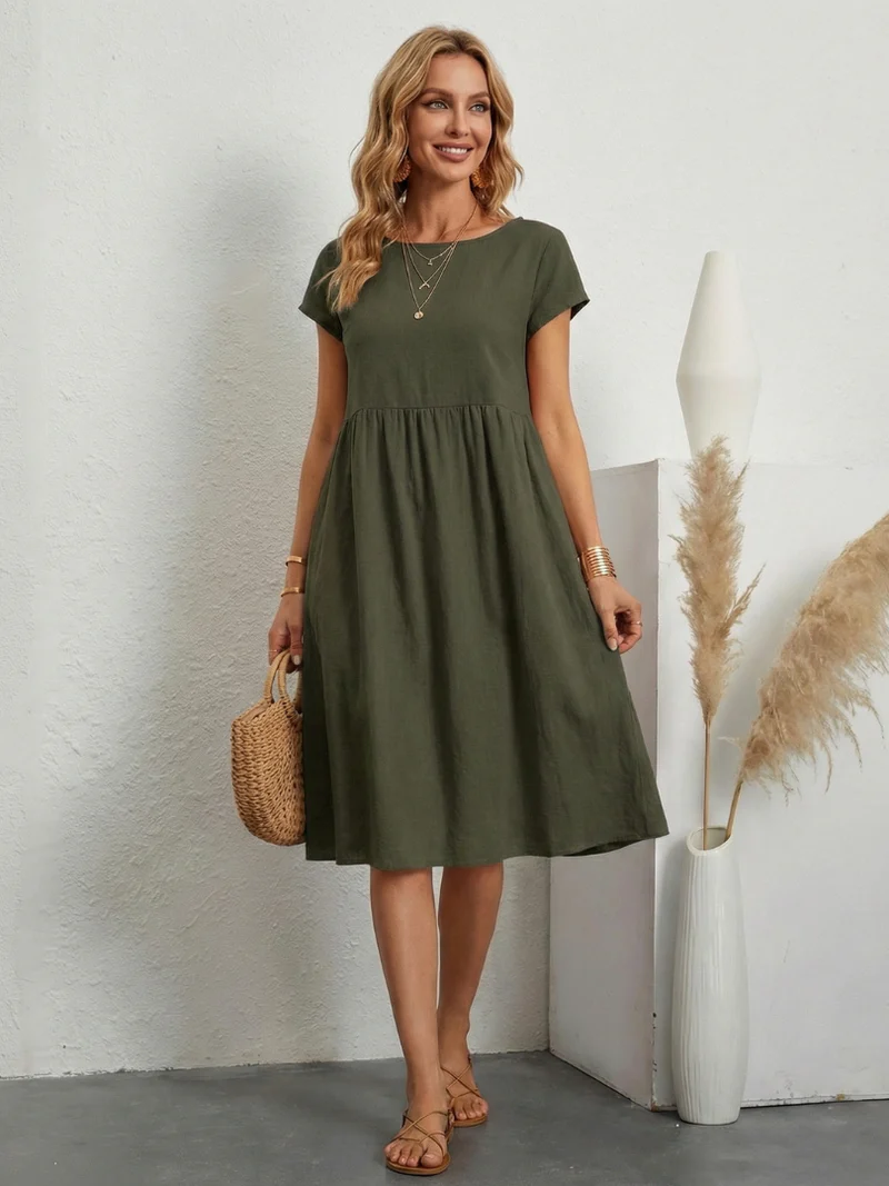 ELEGANTE ABITO CON TASCHE