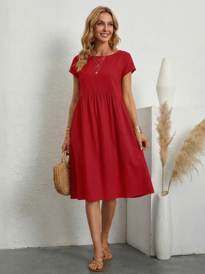 ELEGANTE ABITO CON TASCHE