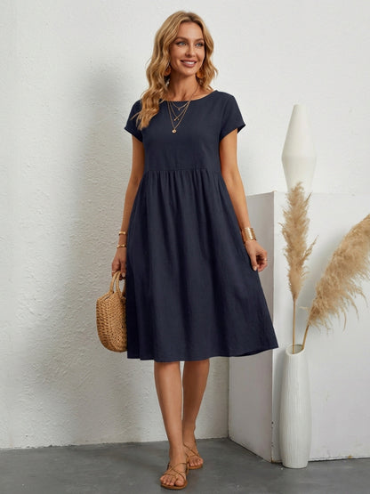 ELEGANTE ABITO CON TASCHE